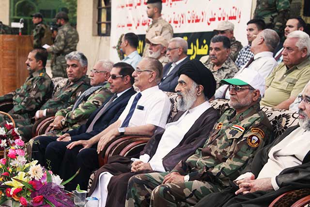 جامعة أهل البيت عليهم السلام تستعرض طلابها المقاتلين في دورة أنصار الحسين للحشد الشعبي